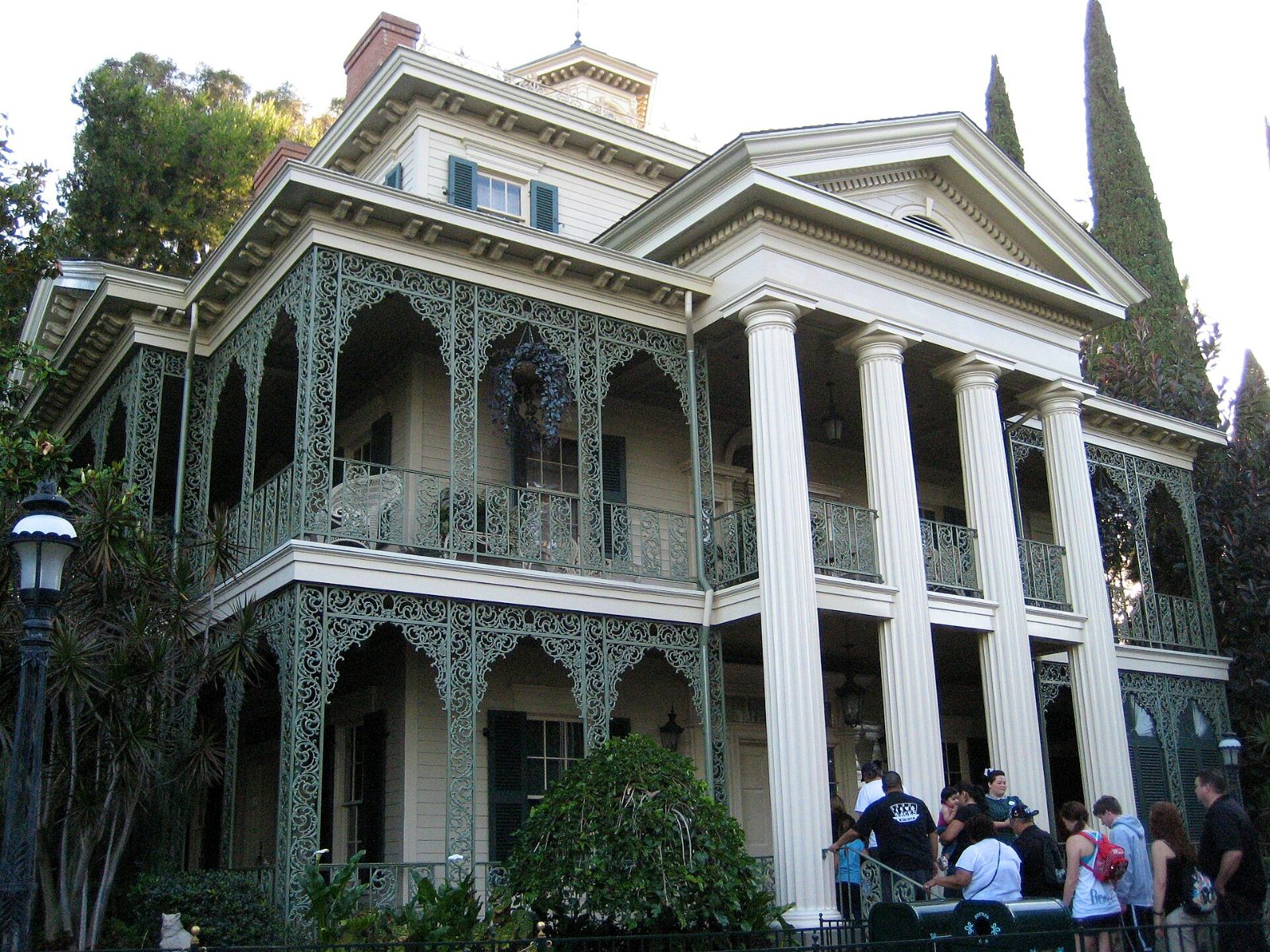 The mansion's two-storey cast-iron galleries and white portico columns